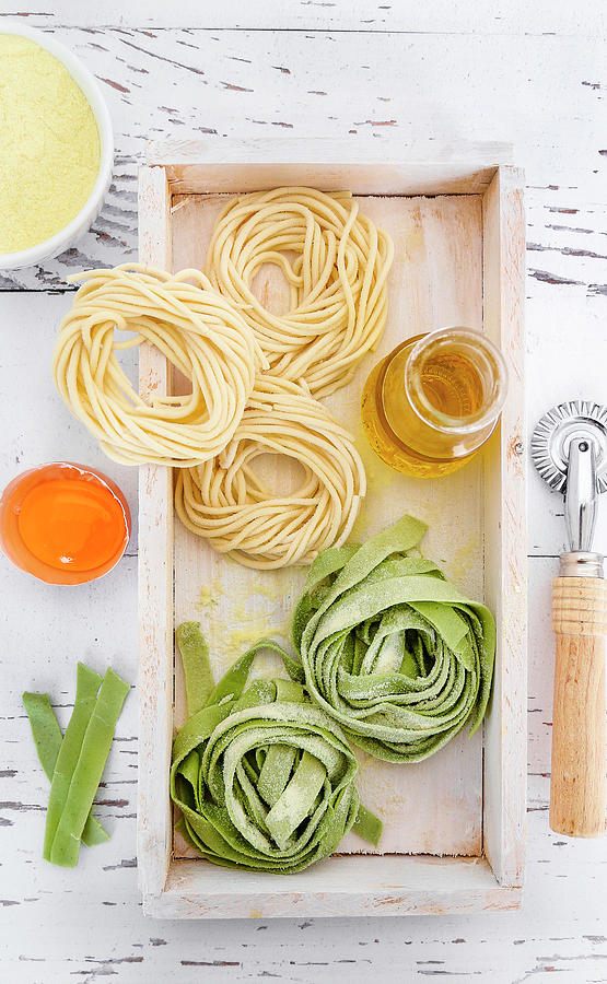Home Made Spaghetti And Green Tagliatelle Photograph by Claudia Gargioni