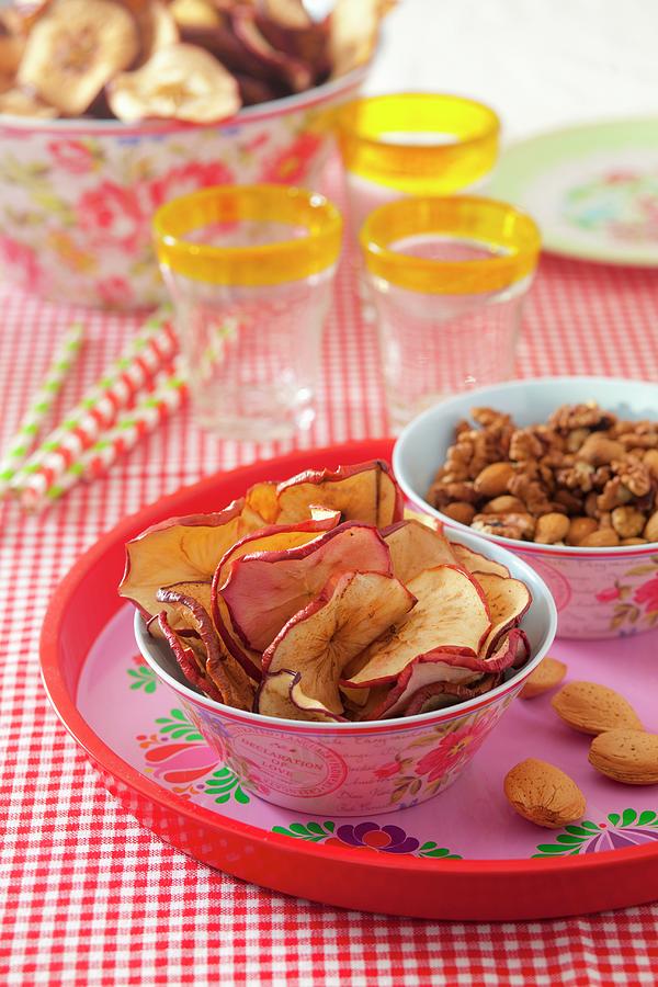 Homemade Apple Chips As A Snack Photograph by Studio Lipov
