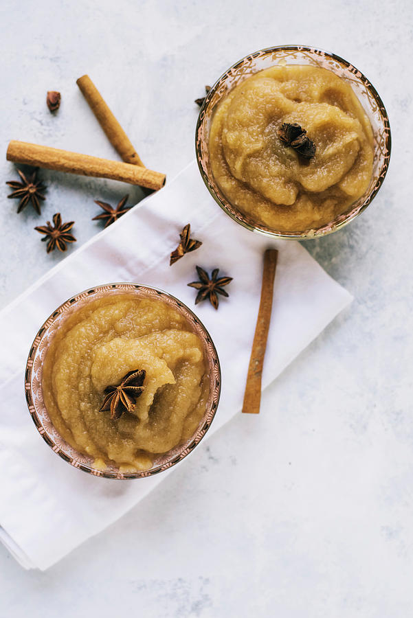 Homemade Apple Sauce With Cinnamon And Star Anise Photograph by Megan Von Schonhoff