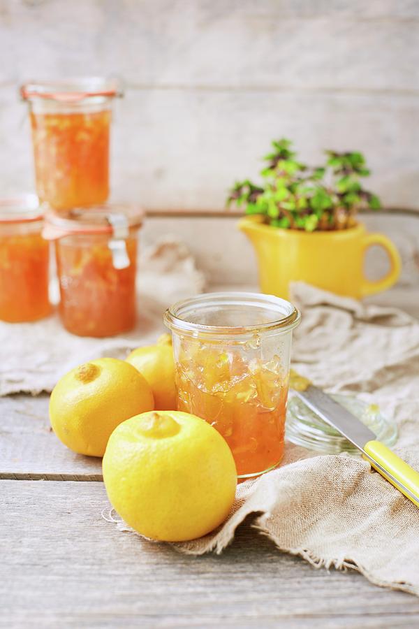 Fruit Photograph - Homemade Bergamot Jam In Preserving Jars by Sabine Lscher