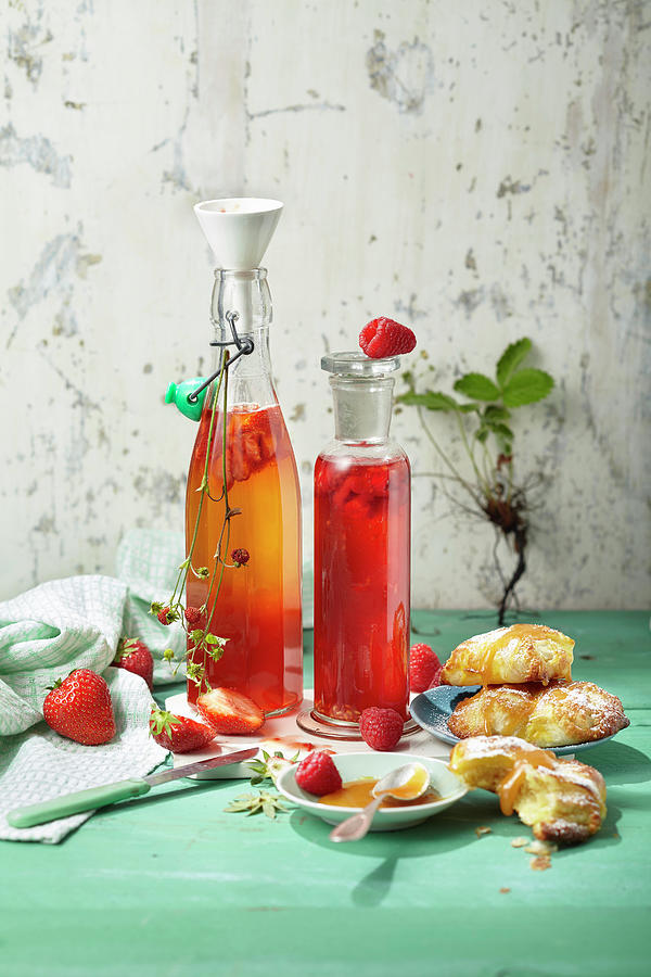 Homemade Berry Vinegar Made From Raspberries And Strawberries Photograph by Ulrike Stockfood Studios / Holsten