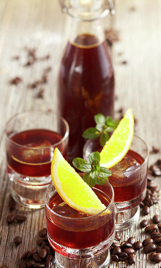 Homemade Brazilian Coffee Liqueur With Orange, Lemon, Coffee Beans And Rum Photograph by Teubner Foodfoto
