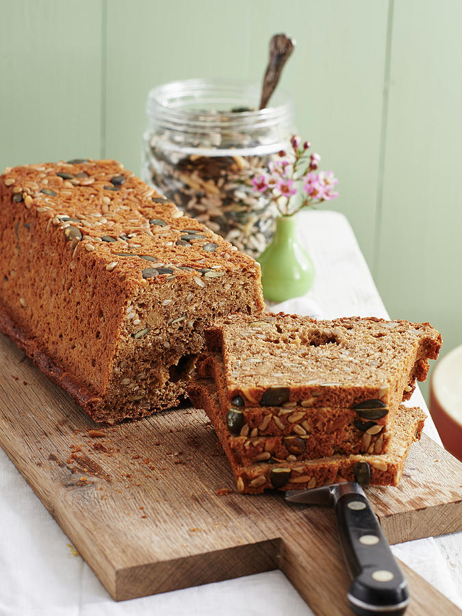 Homemade Brown Bread With A Seed Mix Photograph by Hannah Kompanik