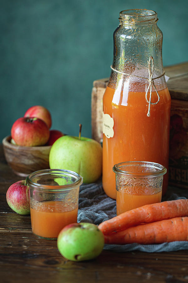 Homemade Carrot And Apple Juice Photograph by Mimis Kingdom Fine Art