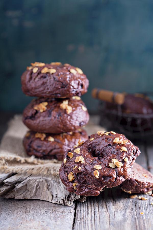 Cereal Photograph - Homemade Chocolate Bagels On A Rustic Surface by Elena Veselova