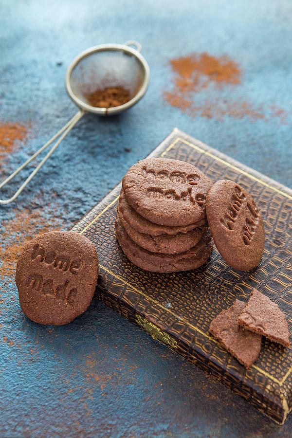 Homemade Chocolate Biscuits Dusted With Cocoa Powder Photograph by Aniko Takacs