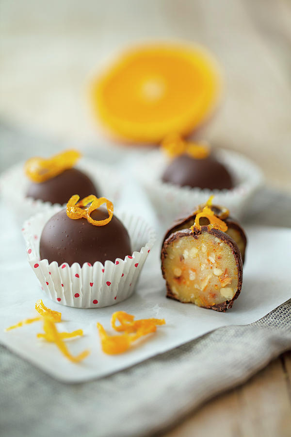 Homemade Chocolates With Marzipan-orange-nut Filling Photograph by Jan Wischnewski
