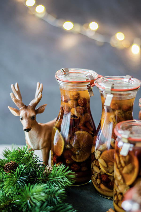 Homemade Christmas Liqueur With Dried Fruits, Citrus And Nuts Photograph by Diana Kowalczyk