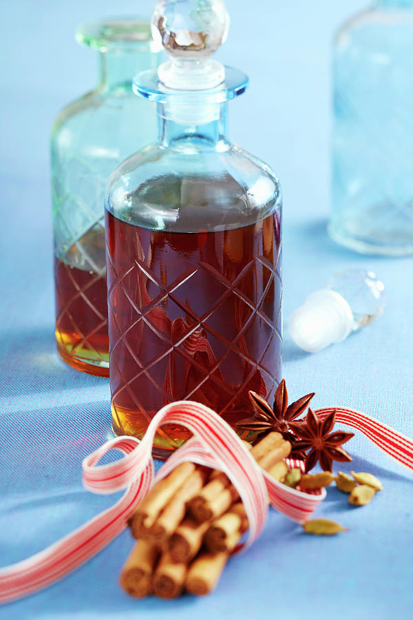 Homemade East Frisian Winter Liqueur With Star Anise, Cinnamon, Corn Schnapps And Rock Sugar Photograph by Teubner Foodfoto