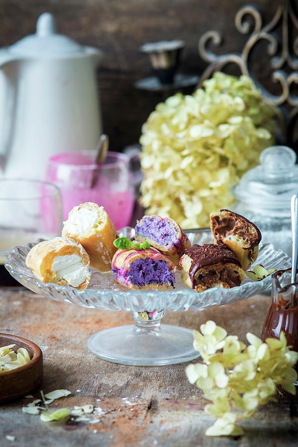 Homemade Eclairs With Vanilla Buttercream, Blueberry And Chocolate Fillings Photograph by Irina Meliukh