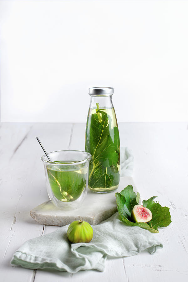 Homemade Fig Leaf Tea With An Insulated Glass Photograph by Jamie Watson