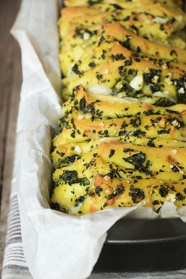 Homemade Garlic Bread With Herbs Photograph by Alice Del Re