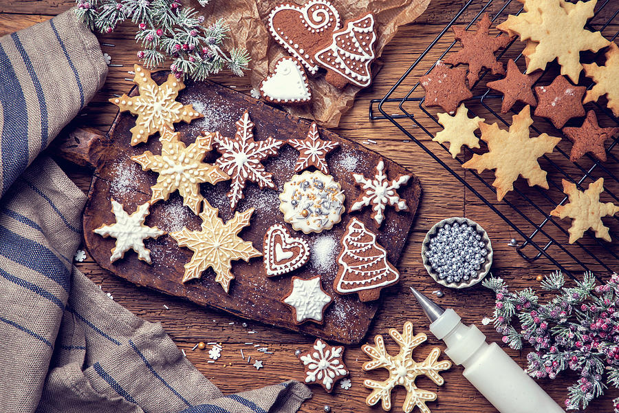 Homemade Gingerbread And Butter Biscuits With Royal Icing Photograph by Elena Schweitzer