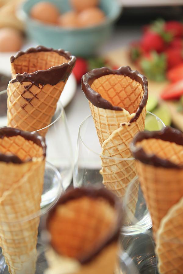 Homemade Ice Cream Cones With Chocolate Edges In Glasses Photograph by Great Stock!