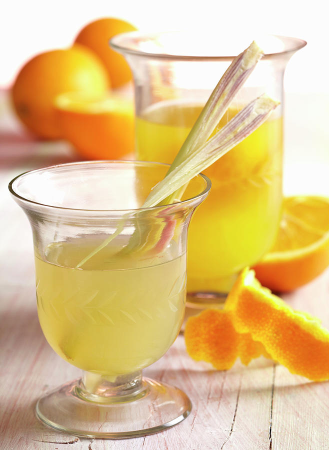 Homemade Lemon And Orange Vinegar With Lemongrass Photograph by Teubner Foodfoto