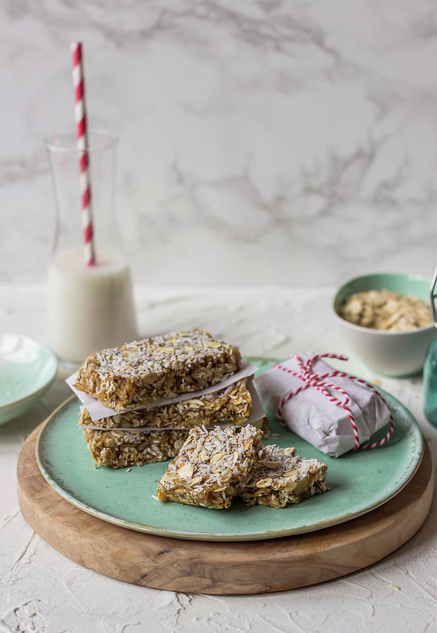 Homemade Muesli Bars From Nuts And Dried Fruits With Oats, Milk In A Glass Photograph by Zuzanna Ploch