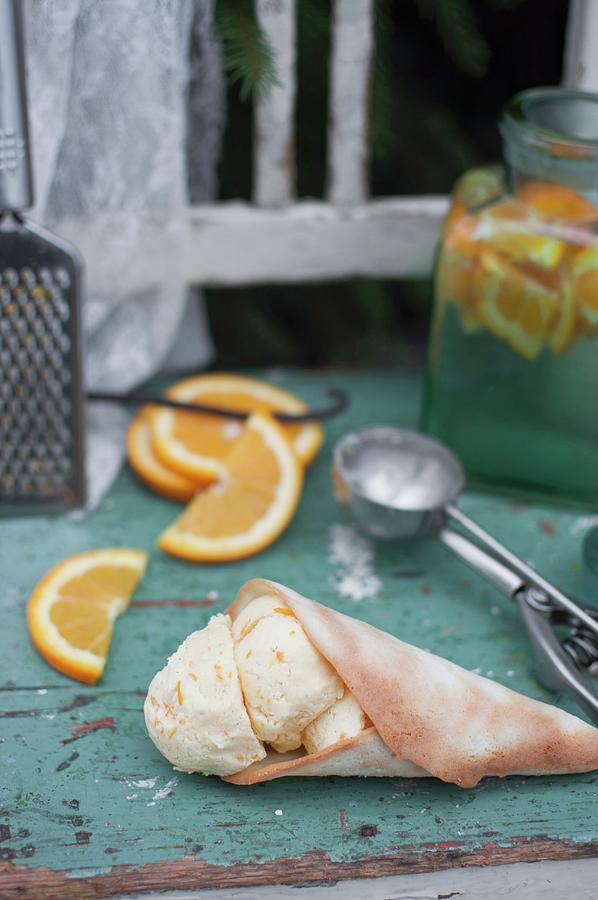 Homemade Orange And Vanilla Ice Cream Served In A Cone Photograph by Kachel Katarzyna