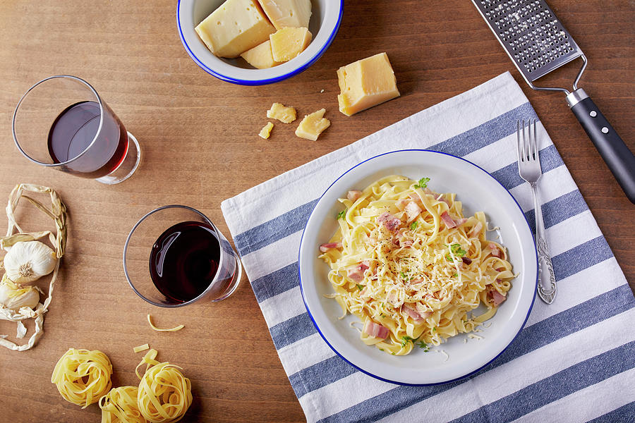 Homemade Pasta Carbonara With Parmesan Cheese And A Glass Of Red Wine Photograph by Natasa Dangubic