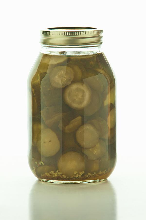 Homemade Pickles In A Screw-top Jar Photograph by William Boch