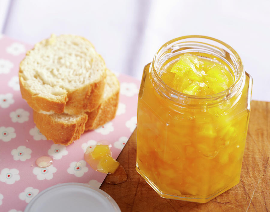 Homemade Pineapple And Ginger Jam In A Screw-top Jar With Bagette Photograph by Teubner Foodfoto