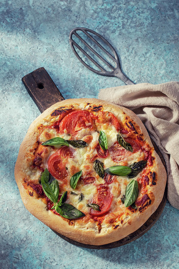 Homemade Pizza Margherita Photograph by Andrey Maslakov