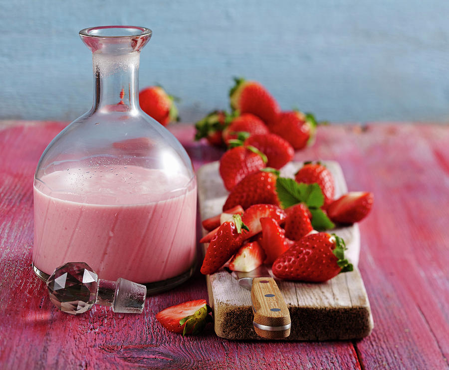 Homemade Strawberry Cream Liqueur With Fresh Berries And Vodka Photograph by Teubner Foodfoto