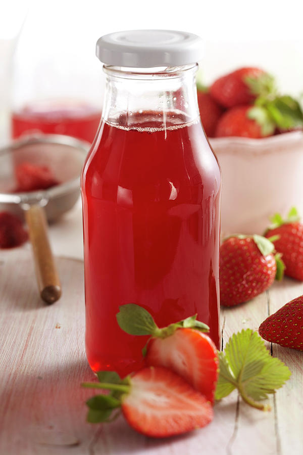 Homemade Strawberry Vinegar Photograph by Teubner Foodfoto
