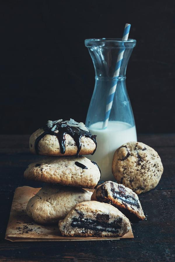 Homemade Stuffed Chocolate Chip Cookies And A Bottle Of Milk Photograph by Ltummy