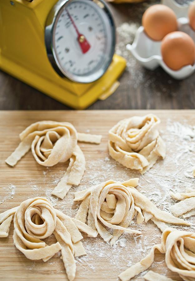 Homemade Tagliatelle On A Wooden Board Photograph by Dorota Indycka