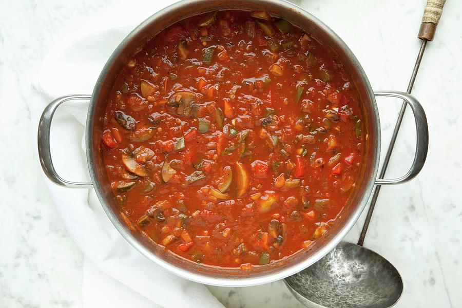 Homemade Tomato Sauce In A Large Pot Photograph by William Boch