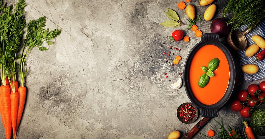 Homemade Vegetable Soup In A Black Bowl On Grey Stone Background Photograph by Natalia Klenova