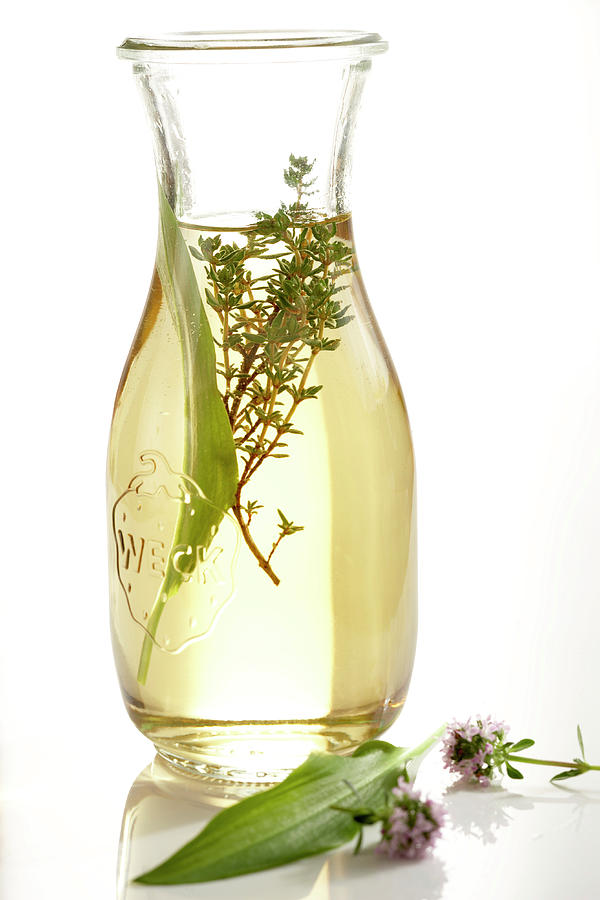 Homemade Wild Garlic Vinegar Photograph by Teubner Foodfoto
