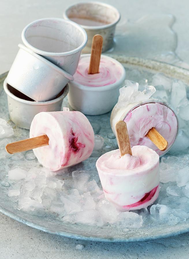 Homemade Yoghurt, Raspberry, And Blackberry Ice Lollies On A Tray With