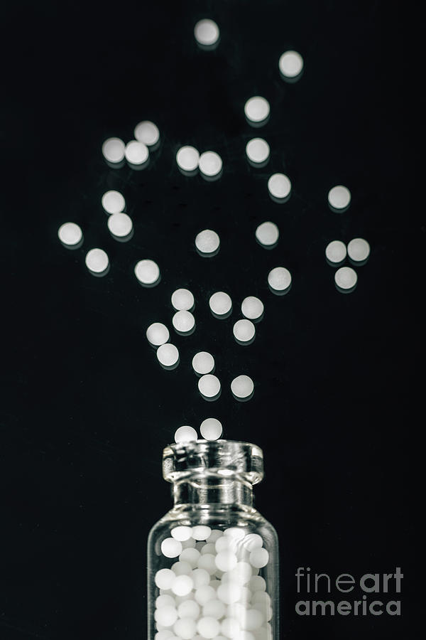 Bottle Photograph - Homeopathic Globules Scattered Out Of Glass Bottle by Microgen Images/science Photo Library