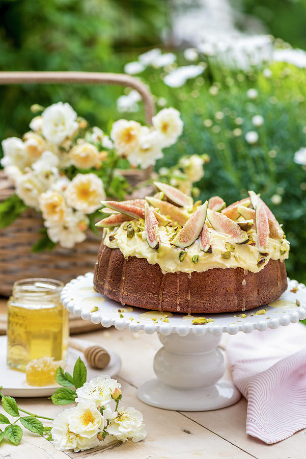 Honey And Fig Cake With Pistachio Nuts Photograph by Winfried Heinze