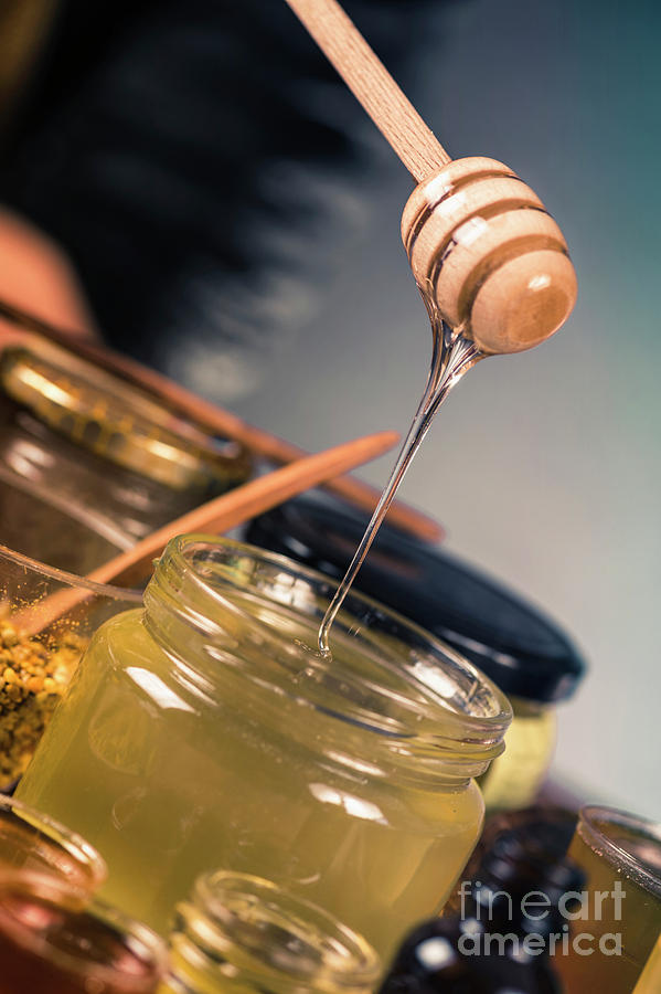 Honey Flowing Into A Glass Jar Photograph by Microgen Images/science Photo Library