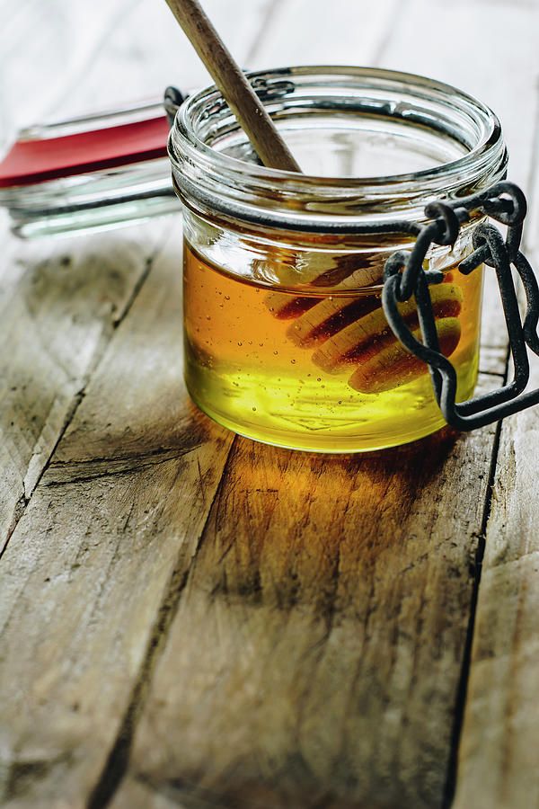 Honey In Glass Jar Photograph by Mateusz Siuta