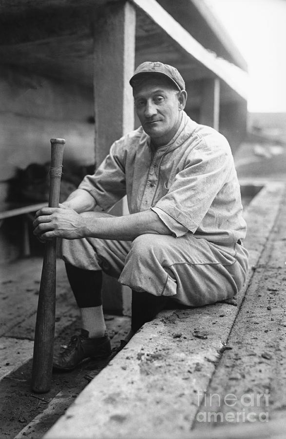 Honus Wagner Seated Holding Baseball Bat Photograph by Bettmann