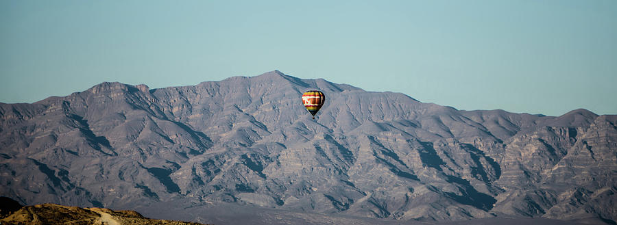 Hot Air Balloon Flying Above Red Rock Canyon Photograph by Alex Grichenko