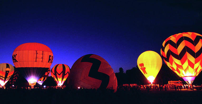 Hot Air Balloons Illumination Photograph by Bill Cain