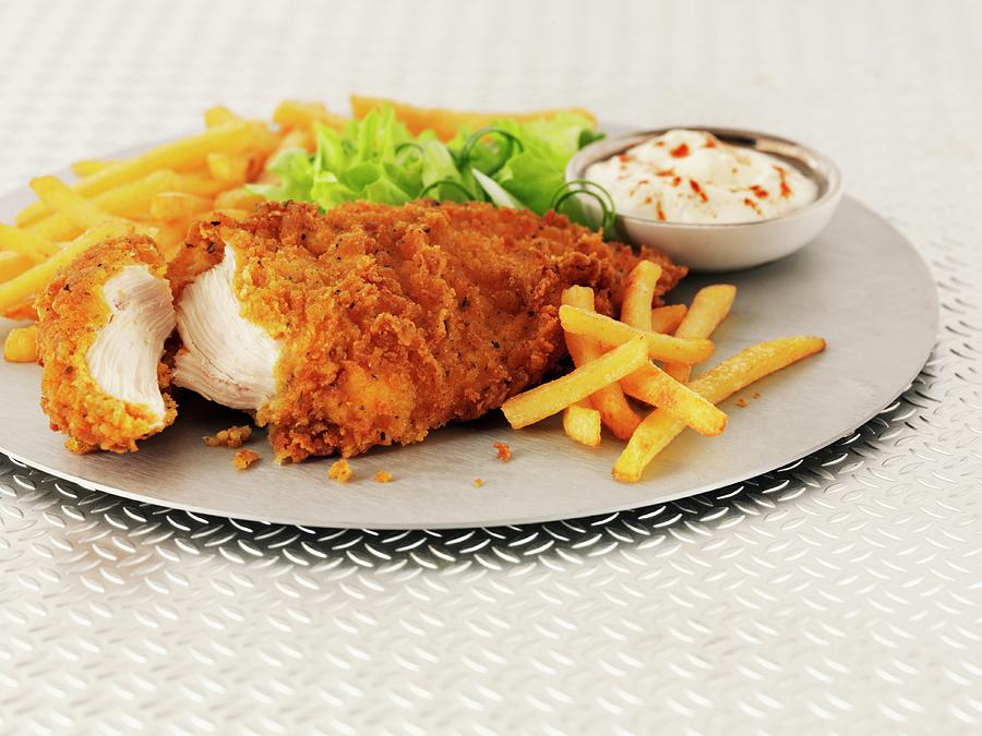 Hot And Spicy Chicken Breast With Chips, Salad And Mayonnaise Photograph by Frank Adam