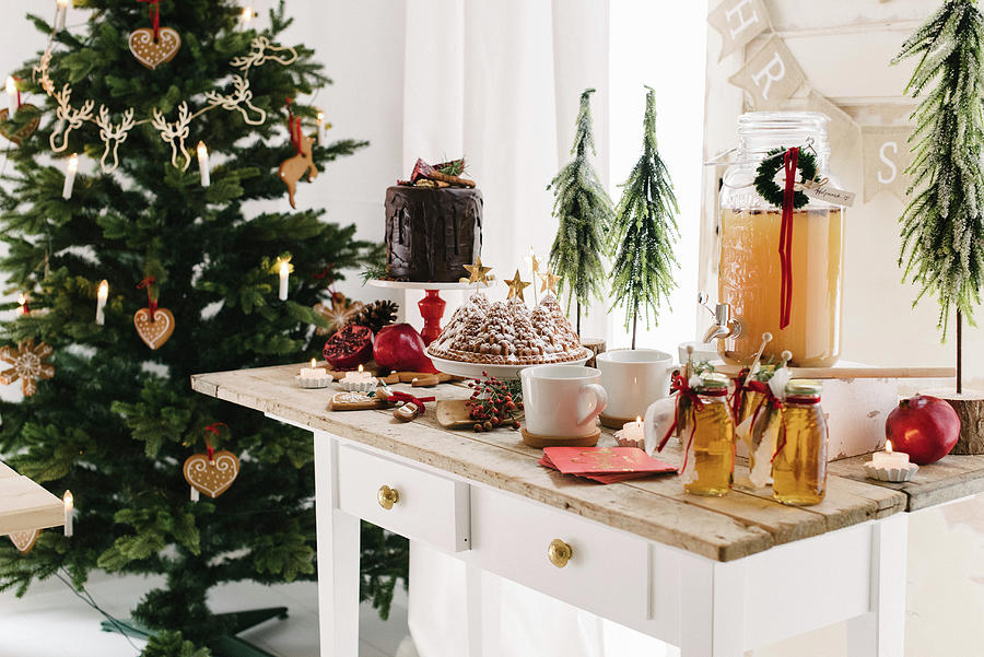 Cake Photograph - Hot Apple Punch, Bundt Cake And Drip Cake On Dessert Buffet In Front Of Christmas Tree by Katja Heil