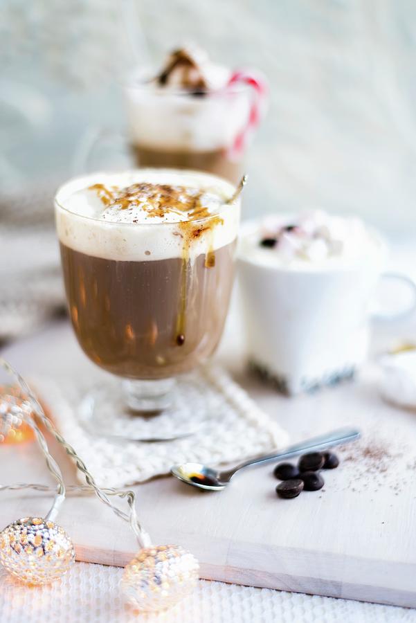 Hot Chocolate And Various Coffee Drinks For Christmas Photograph by Lucy Parissi