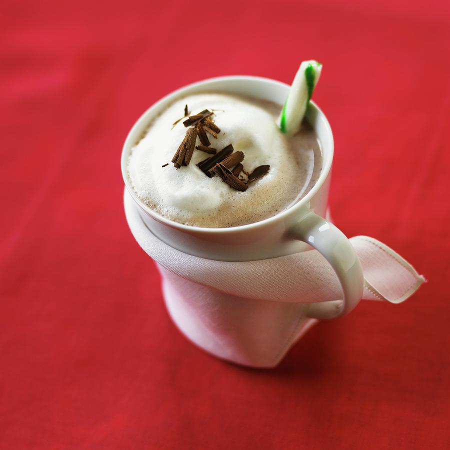Hot Chocolate Garnished With A Candy Cane And Grated Chocolate Photograph by Vincent Noguchi Photography