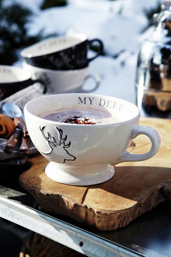 Hot Chocolate In A Cup With A Stag Motif Photograph by Jalag / Olaf Szczepaniak