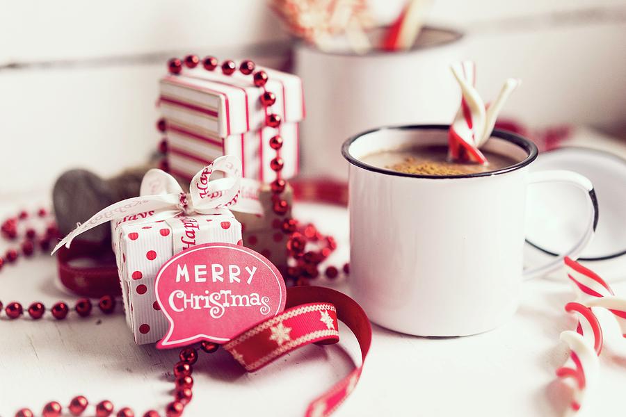 Hot Chocolate With Candy Canes And Christmas Decorations Photograph by Alena Haurylik