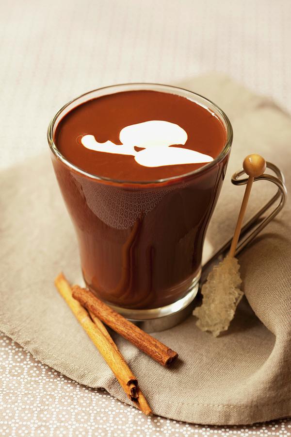 Hot Chocolate With Cinnamon And A Stick Of Rock Sugar Photograph by Hilde Mche