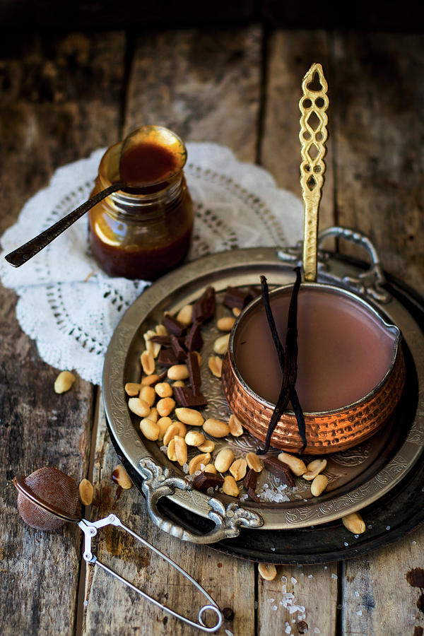 Hot Chocolate With Peanut Caramel In A Copper Pan Photograph by Lana Konat