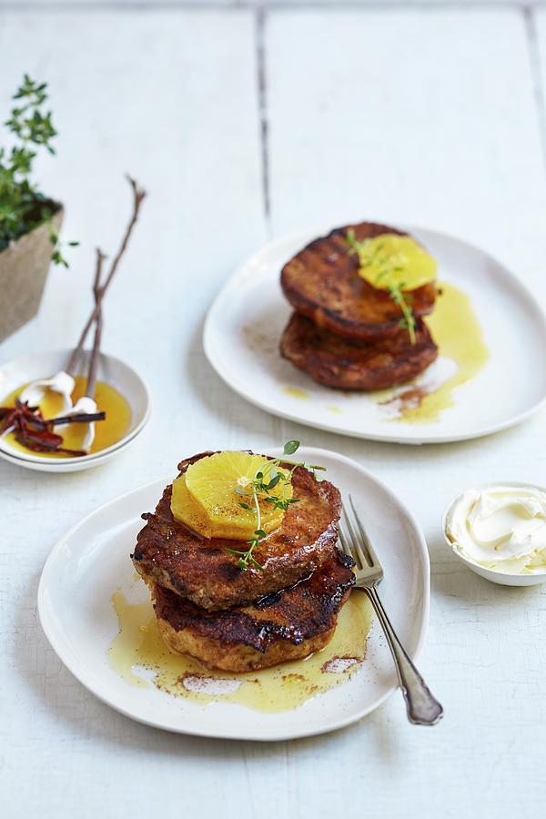 Hot Cross Bun French Toast With Orange Slices And Orange Syrup Photograph by Great Stock!