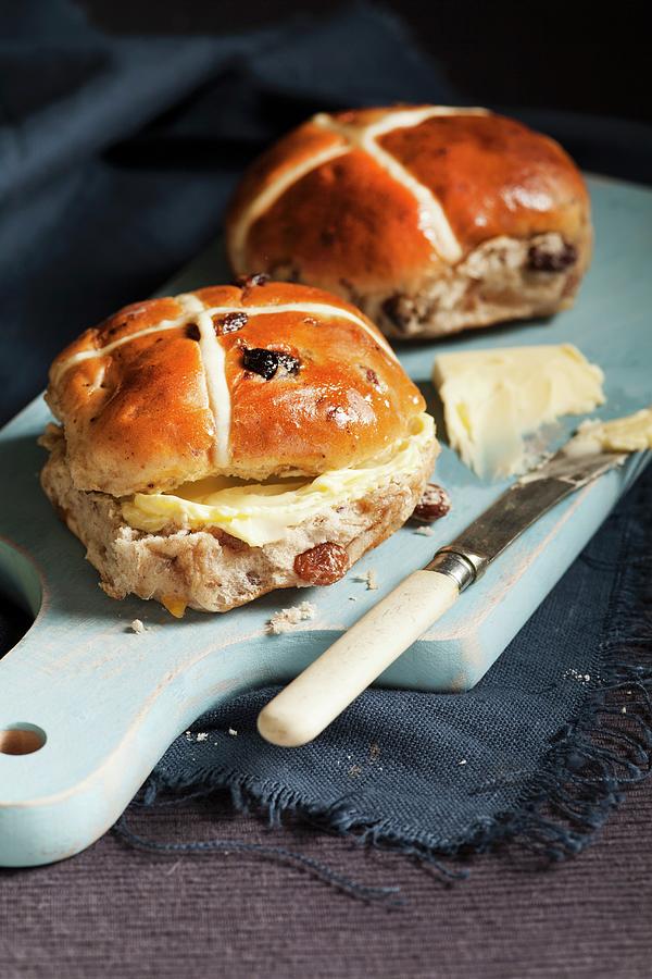 Hot Cross Buns With Butter On A Wooden Chopping Board easter Baking, England Photograph by Stacy Grant